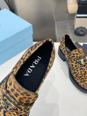 PRADA 26S LOAFERS IN BROWN LEOPARD PRINT PONY HAIR