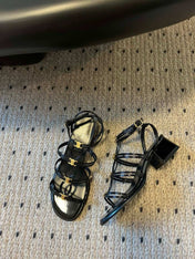 CLEMENCE MULTI TRIOMPHE 45 MM SANDAL IN BLACK LAMBSKIN