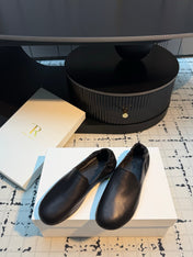 THE ROW 26S LOAFERS IN BLACK CALFSKIN