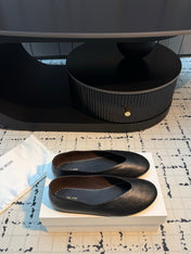 THE ROW 26S CLASSIC BALLET FLATS IN BLACK CALFSKIN