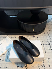 THE ROW 26S CLASSIC BALLET FLATS IN BLACK CALFSKIN