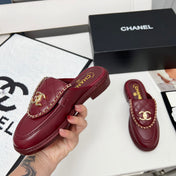 CHANEL 25S MULES WITH CHAIN DETAIL IN BURGUNDY CALFSKIN GOLD HARDWARE