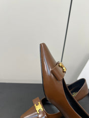 TRIOMPHE POINTED-TOE HIGH PUMPS IN BROWN SHINY CALFSKIN