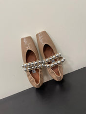 ALAIA BALLET FLATS IN ALMOND BEIGE GLOSSY CALFSKIN WITH SILVER HARDWARE