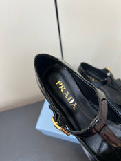BOW MARY JANE PUMPS WITH T-STRAP IN BLACK GLOSSY CALFSKIN