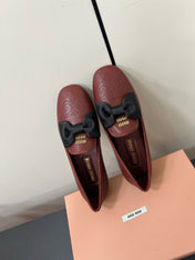 LOAFERS WITH BOW IN RED BROWN SHEEPSKIN