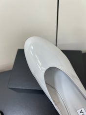 ALAIA WEDGE MULES 25S IN WHITE LAMBSKIN