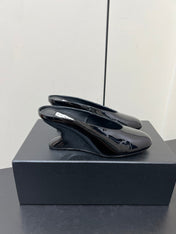 ALAIA WEDGE MULES 25S IN BLACK LAMBSKIN