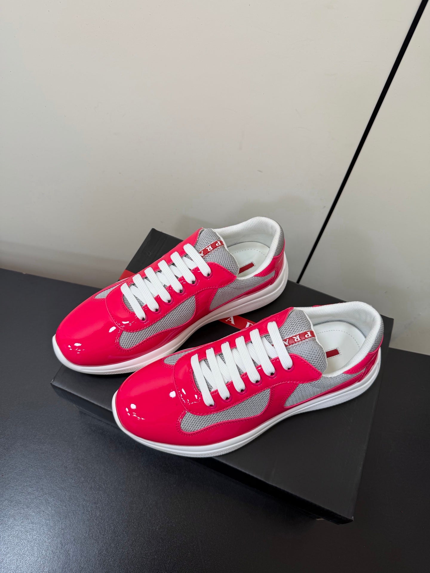PRADA 26S SNEAKERS IN PINK PATENT CALFSKIN AND WHITE MESH