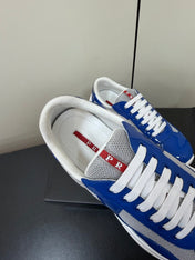 PRADA 26S SNEAKERS IN DARK BLUE PATENT CALFSKIN AND WHITE MESH