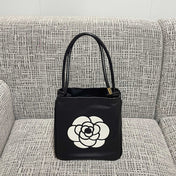 CHANEL 26S LOGO SHOPPING TOTE BAG 25 IN BLACK AND WHITE CALFSKIN GOLD HARDWARE