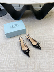 SLINGBACK PUMPS ATTACHED BOW IN BLACK GLOSSY CALFSKIN