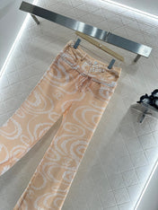 CHANEL BEIGE PRINTED DENIM PANTS