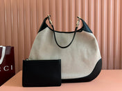 BODY MEDIUM SHOULDER BAD 49 IN NATURAL CANVAS AND BLACK CALFSKIN GOLD HARDWARE