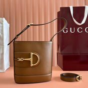 73 SMALL BUCKET BAG 20 IN BROWN SMOOTH CALFSKIN