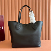 MEDIUM TOTISSIMA REVERSIBLE TOTE BAG 30 IN BLACK CALFSKIN BEIGE AND BROWN GG CANVAS ON SIDE