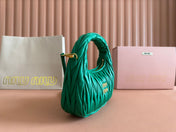 WANDER MATELASSÉ HANDBAG 23 IN PINE GREEN LAMBSKIN