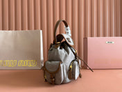 BACKPACK 22 IN GREY CANVAS BROWN CALFSKIN