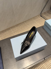 PRADA 26S POINTED TOE HEELS 75MM IN BLACK CALFSKIN WITH BOW