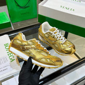 BOTTEGA VENETA 26S ORBIT SNEAKERS IN GOLD TECHNICAL MESH