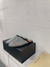 ALAIA FLAT MULES IN STRASS BLACK LAMBSKIN WITH RHINSTONES