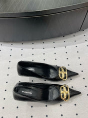 HEELED PUMPS 65 MM IN BLACK LIZARD PATTERN CALFSKIN GOLD HARDWARE