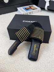 FLAT SLIDE IN BLACK SUEDE WITH GOLD CRYSTALS