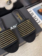 FLAT SLIDE IN BLACK SUEDE WITH GOLD CRYSTALS