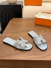 HM 26S ORAN STUDDED SANDALS IN DUSTY BLUE CALFSKIN