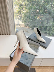 ZIPPER POINTED-TOE HIGH PUMPS IN WHITE WAX-OIL SHEEPSKIN
