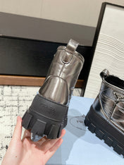 MONOLITH ANKLE BOOTS IN METALLIC GRAY CALFSKIN AND LAMB FUR LINING