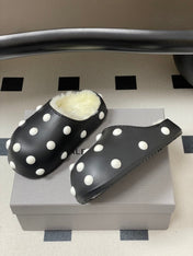 BALENCIAGA 25S FUR-LINED MULES IN BLACK AND WHITE FAUX LEATHER