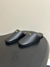 MIUMIU 26S MULE LOAFERS IN BLACK CALSKIN