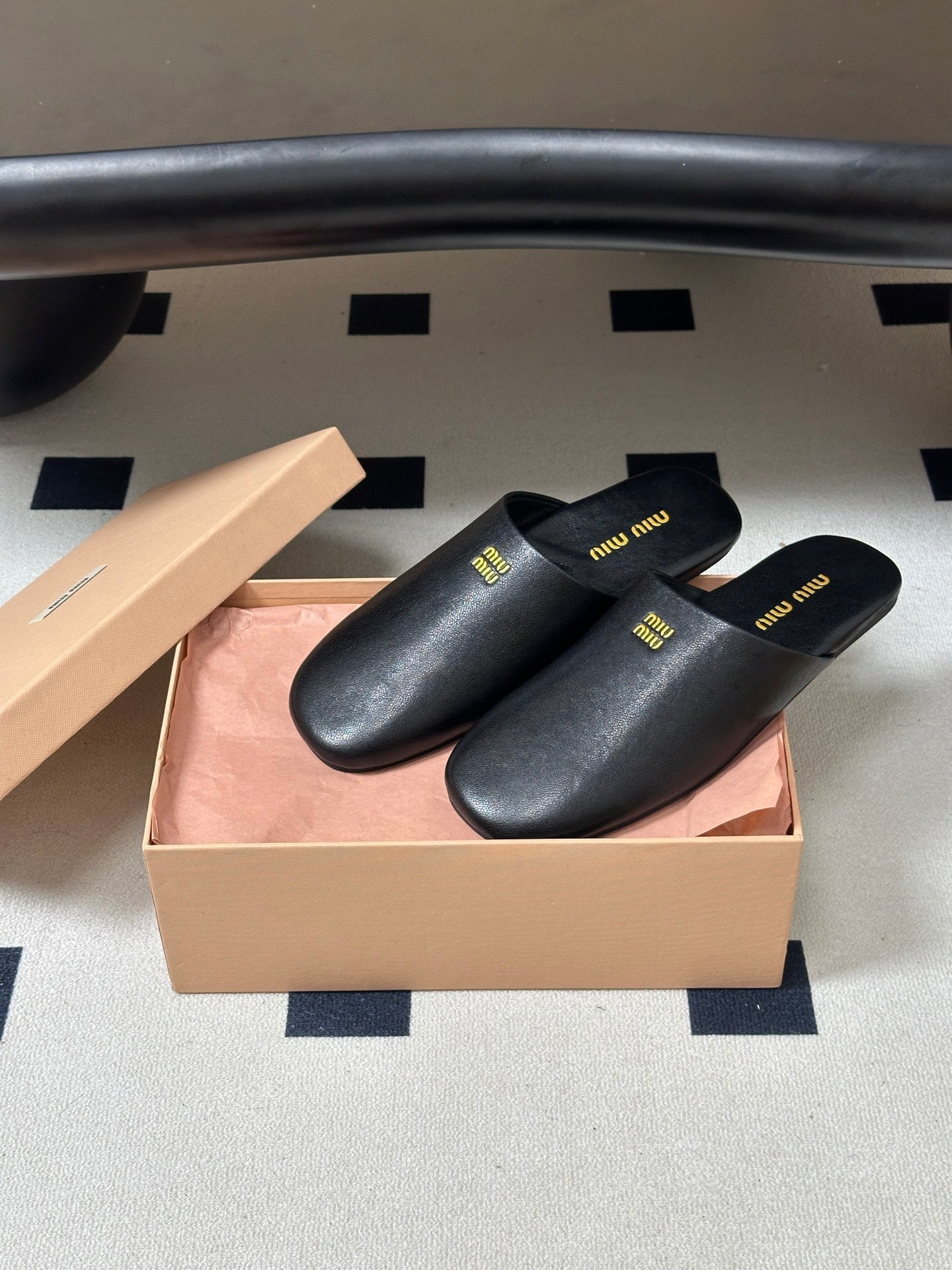 MIUMIU 26S MULE LOAFERS IN BLACK CALSKIN