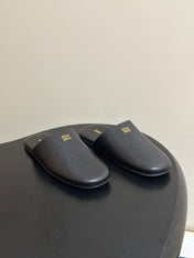 MIUMIU 26S MULE LOAFERS IN BLACK CALSKIN