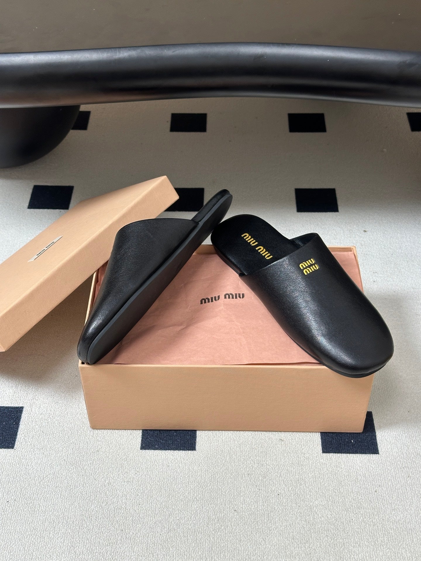 MIUMIU 26S MULE LOAFERS IN BLACK CALSKIN