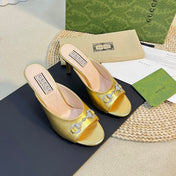 GG  Women's Horsebit mid-heel slide sandal in Gold