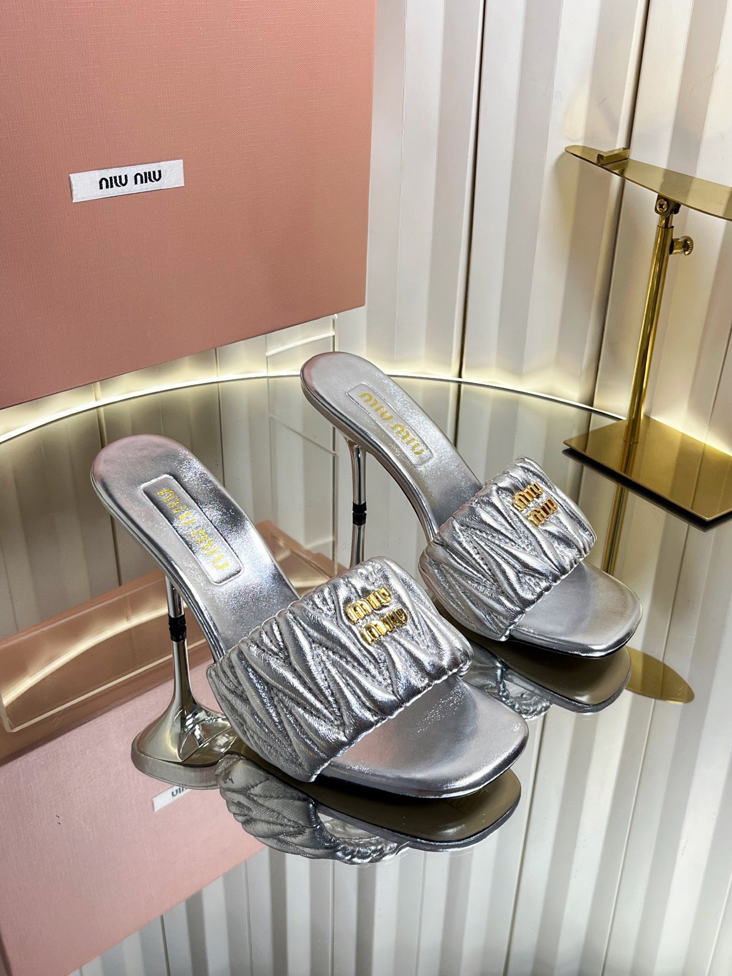 MIUMIU 26S HIGH-HEEL MULE SANDALS 85MM IN SILVER CALFSKIN GOLD HARDWARE