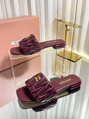 MIUMIU 26S MATELASSE SLIDES IN BURGUNDY RED CALFSKIN GOLD HARDWARE