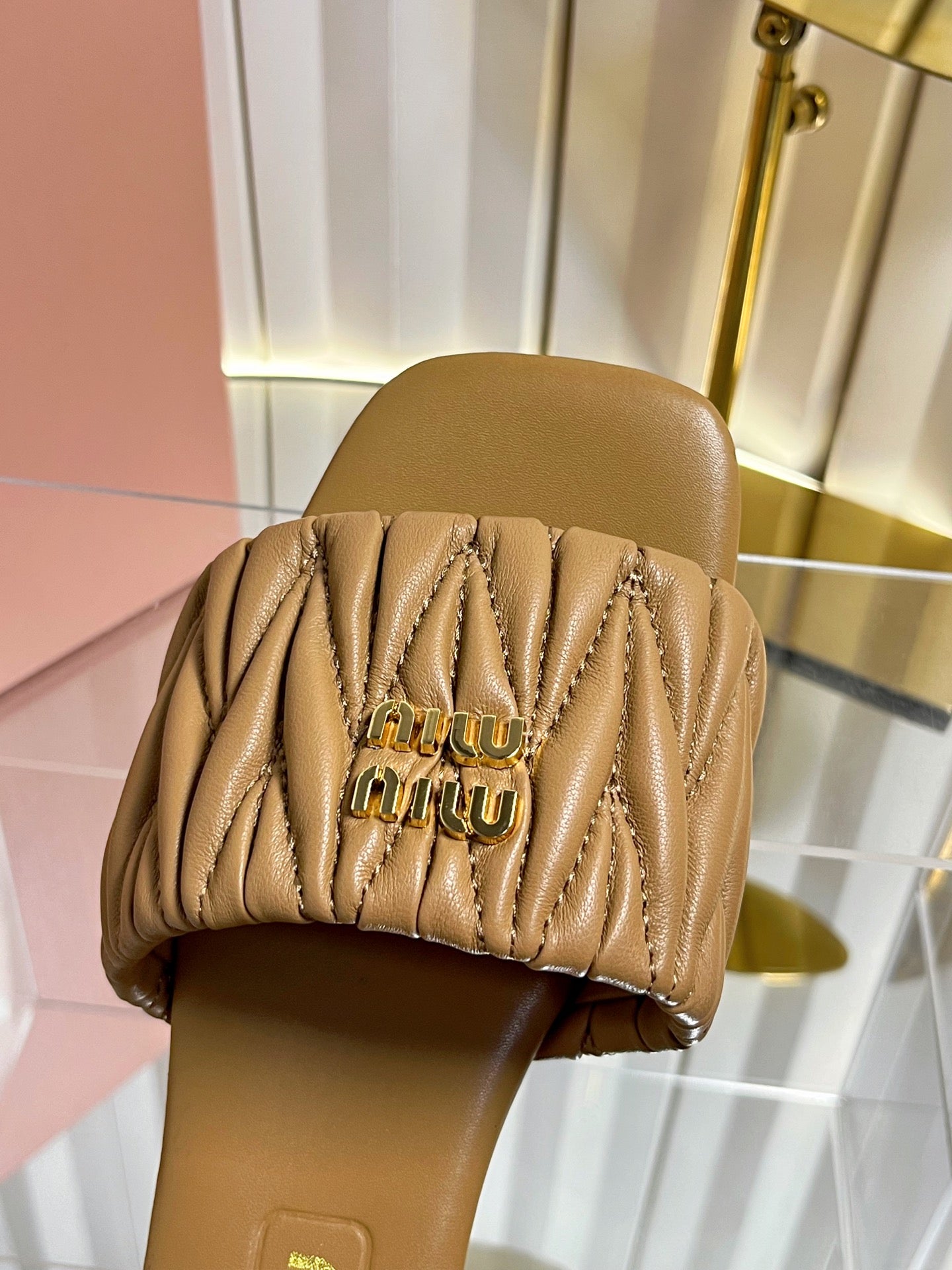 MIUMIU 26S MATELASSE SLIDES IN TAN BROWN CALFSKIN GOLD HARDWARE