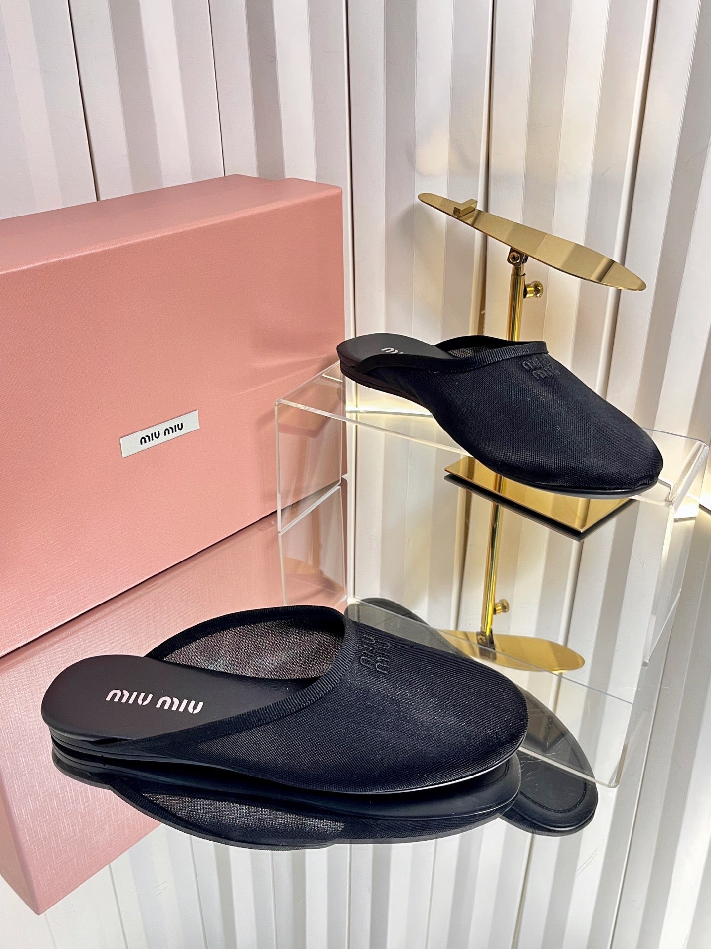 MIUMIU 26S FLAT MULES IN BLACK FABRIC AND LEATHER 