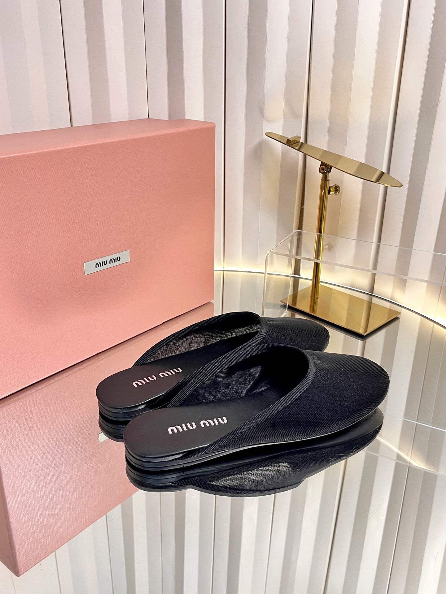 MIUMIU 26S FLAT MULES IN BLACK FABRIC AND LEATHER 