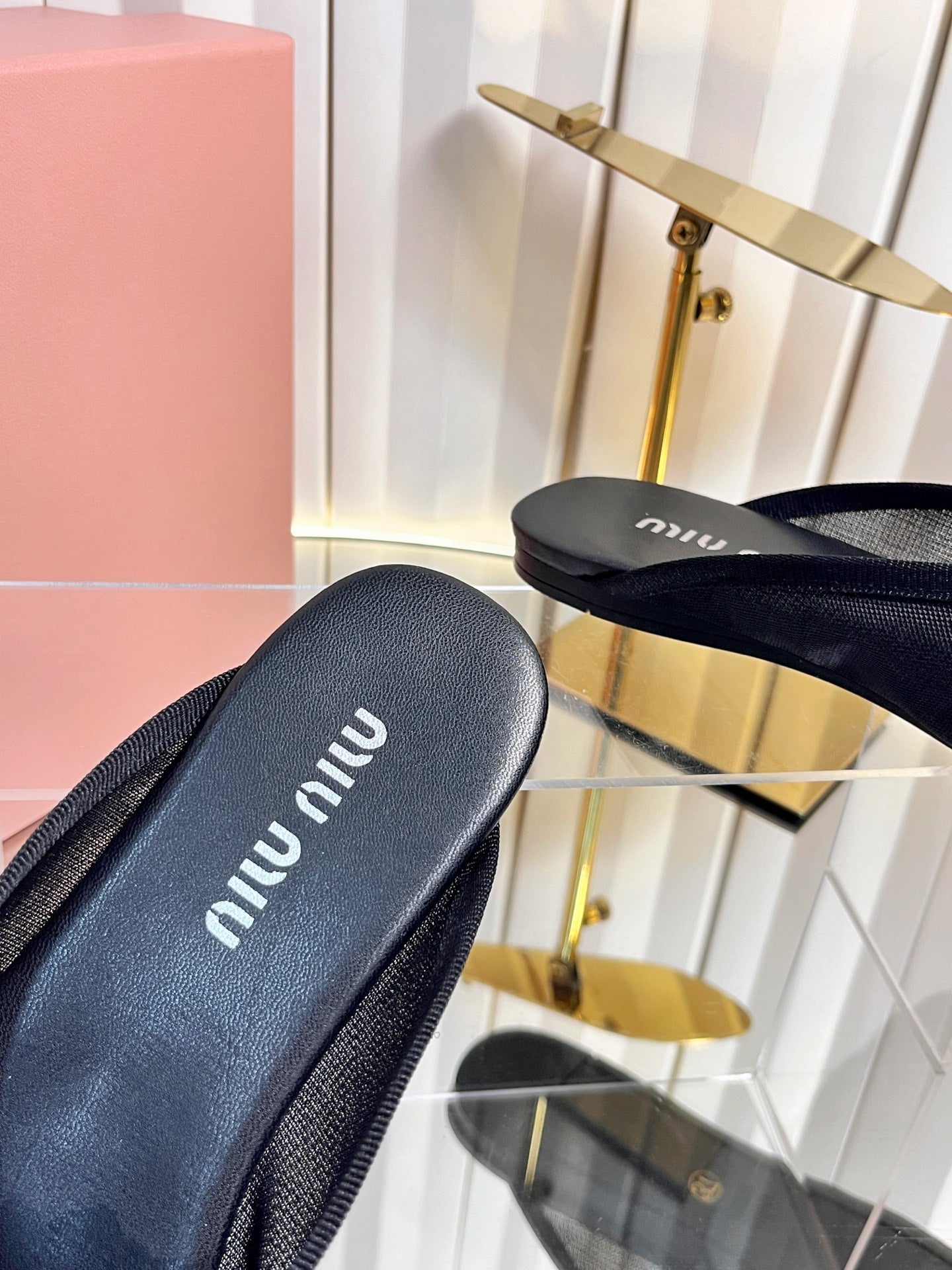 MIUMIU 26S FLAT MULES IN BLACK FABRIC AND LEATHER 