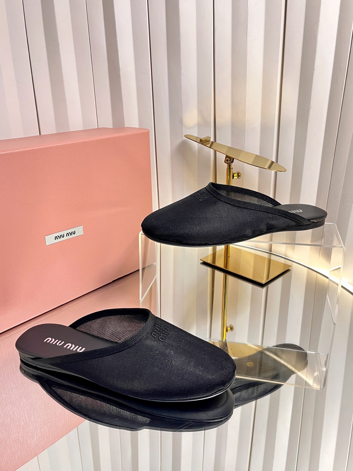 MIUMIU 26S FLAT MULES IN BLACK FABRIC AND LEATHER 