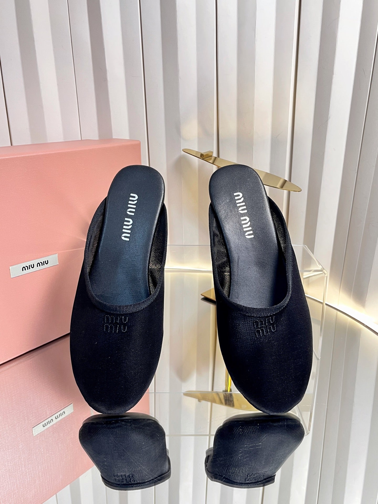 MIUMIU 26S FLAT MULES IN BLACK FABRIC AND LEATHER 