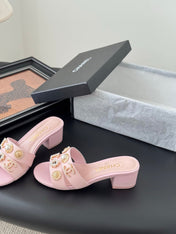 MULE SLIDE SANDALS IN PINK LAMBSKIN WITH LOGO STICKER DETAIL