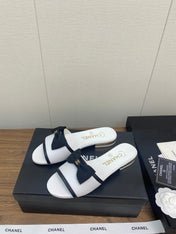 BOW SLIPPERS IN WHITE LAMBSKIN