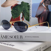 FIRST CRYSTAL RIMLESS OVAL FRAME SUNGLASSES 557152 IN METAL
