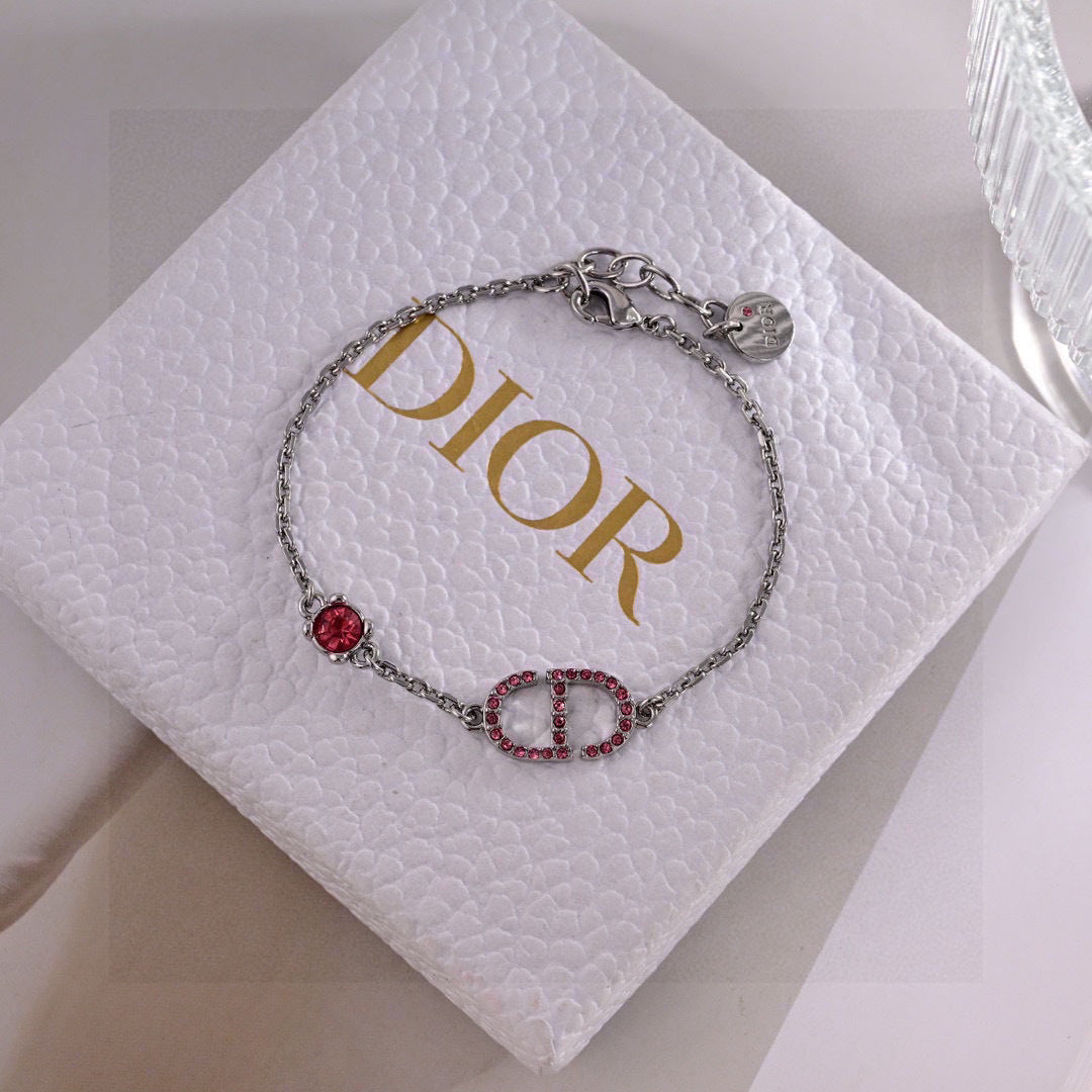 CD 26S PAVE LOGO RED CRYSTAL BRACELET IN SILVER TONE METAL 631790