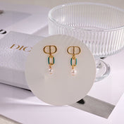 CD 26S LOGO ENAMEL LINK PEARL DROP EARRINGS IN GOLD METAL